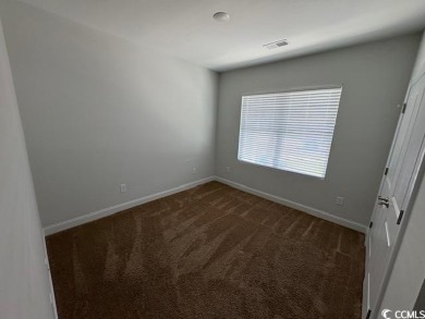 This beautiful 4-bedroom, 2-bathroom home is located in the on Surf Golf and Beach Club in South Carolina - for sale on GolfHomes.com, golf home, golf lot