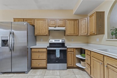 Welcome to this delightful 2-bedroom, 2 full bathroom home on Country Club of Green Valley in Arizona - for sale on GolfHomes.com, golf home, golf lot