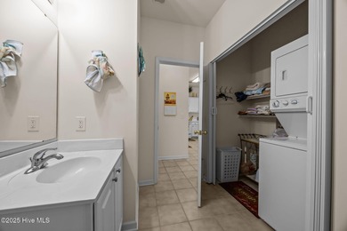 Looking for turnkey ready, vacation, primary home, or investment on Sandpiper Bay Golf and Country Club in North Carolina - for sale on GolfHomes.com, golf home, golf lot