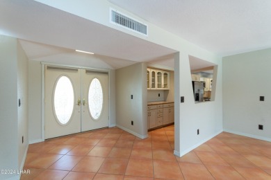 Take a Walk thru this Double Door Skylight Entrance into a on London Bridge Golf Course in Arizona - for sale on GolfHomes.com, golf home, golf lot