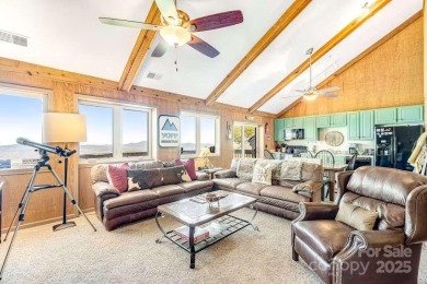 Discover your dream mountain home with this stunning Beech on Beech Mountain Club in North Carolina - for sale on GolfHomes.com, golf home, golf lot