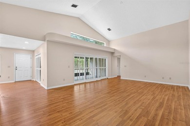 Located in the highly sought-after, guard-gated Hunter's Green on Hunters Green Country Club in Florida - for sale on GolfHomes.com, golf home, golf lot