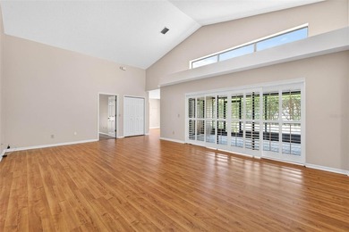 Located in the highly sought-after, guard-gated Hunter's Green on Hunters Green Country Club in Florida - for sale on GolfHomes.com, golf home, golf lot