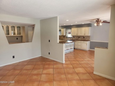 Take a Walk thru this Double Door Skylight Entrance into a on London Bridge Golf Course in Arizona - for sale on GolfHomes.com, golf home, golf lot