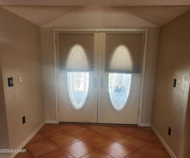 Take a Walk thru this Double Door Skylight Entrance into a on London Bridge Golf Course in Arizona - for sale on GolfHomes.com, golf home, golf lot