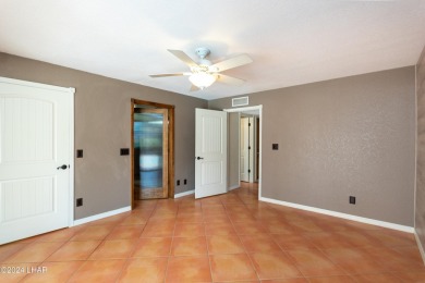 Take a Walk thru this Double Door Skylight Entrance into a on London Bridge Golf Course in Arizona - for sale on GolfHomes.com, golf home, golf lot