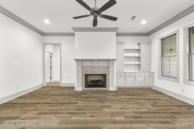 Welcome to this beautiful 4 bedroom, 2.5 bath home located in on Lake Caroline Golf Club in Mississippi - for sale on GolfHomes.com, golf home, golf lot