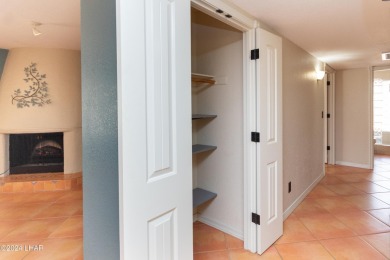 Take a Walk thru this Double Door Skylight Entrance into a on London Bridge Golf Course in Arizona - for sale on GolfHomes.com, golf home, golf lot