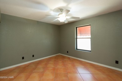 Take a Walk thru this Double Door Skylight Entrance into a on London Bridge Golf Course in Arizona - for sale on GolfHomes.com, golf home, golf lot