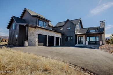 Welcome to 19 Aster Court--where modern design meets effortless on Eagle Ranch in Colorado - for sale on GolfHomes.com, golf home, golf lot