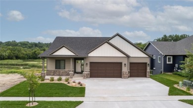 This four-bedroom, three-bathroom rambler home seamlessly on Hadley Creek Golf Course in Minnesota - for sale on GolfHomes.com, golf home, golf lot