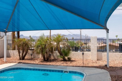 Take a Walk thru this Double Door Skylight Entrance into a on London Bridge Golf Course in Arizona - for sale on GolfHomes.com, golf home, golf lot