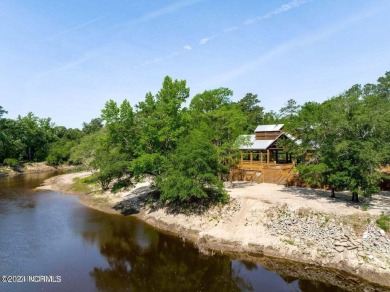 Nestled in the gated golf community of River Landing, this on River Landing Golf Course in North Carolina - for sale on GolfHomes.com, golf home, golf lot