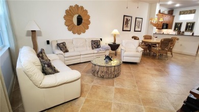 Absolutely stunning 3 bedroom 3 bath coach home overlooking the on The Rookery At Marco in Florida - for sale on GolfHomes.com, golf home, golf lot