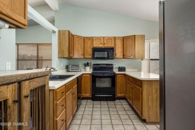 Spacious and bright 2-bed, 2-bath Southwestern-style home just on Sonoma Ranch Golf Course in New Mexico - for sale on GolfHomes.com, golf home, golf lot