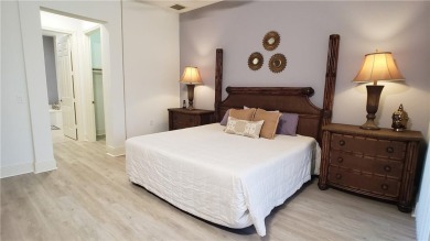 Absolutely stunning 3 bedroom 3 bath coach home overlooking the on The Rookery At Marco in Florida - for sale on GolfHomes.com, golf home, golf lot