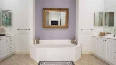 Absolutely stunning 3 bedroom 3 bath coach home overlooking the on The Rookery At Marco in Florida - for sale on GolfHomes.com, golf home, golf lot