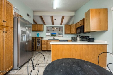 Spacious and bright 2-bed, 2-bath Southwestern-style home just on Sonoma Ranch Golf Course in New Mexico - for sale on GolfHomes.com, golf home, golf lot