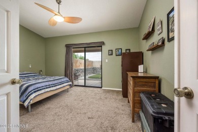 Spacious and bright 2-bed, 2-bath Southwestern-style home just on Sonoma Ranch Golf Course in New Mexico - for sale on GolfHomes.com, golf home, golf lot