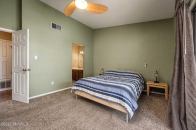 Spacious and bright 2-bed, 2-bath Southwestern-style home just on Sonoma Ranch Golf Course in New Mexico - for sale on GolfHomes.com, golf home, golf lot