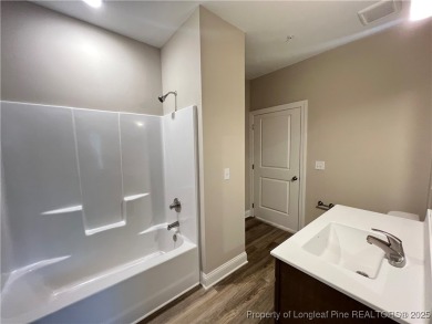 Experience the epitome Condo Living in The Gated Community at on Anderson Creek Golf Club in North Carolina - for sale on GolfHomes.com, golf home, golf lot