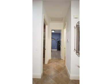 Absolutely stunning 3 bedroom 3 bath coach home overlooking the on The Rookery At Marco in Florida - for sale on GolfHomes.com, golf home, golf lot