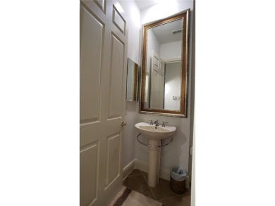 Absolutely stunning 3 bedroom 3 bath coach home overlooking the on The Rookery At Marco in Florida - for sale on GolfHomes.com, golf home, golf lot