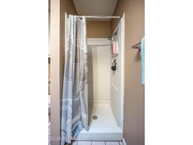 Spacious and bright 2-bed, 2-bath Southwestern-style home just on Sonoma Ranch Golf Course in New Mexico - for sale on GolfHomes.com, golf home, golf lot