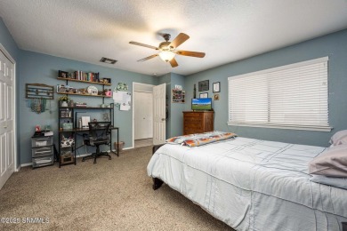 Spacious and bright 2-bed, 2-bath Southwestern-style home just on Sonoma Ranch Golf Course in New Mexico - for sale on GolfHomes.com, golf home, golf lot