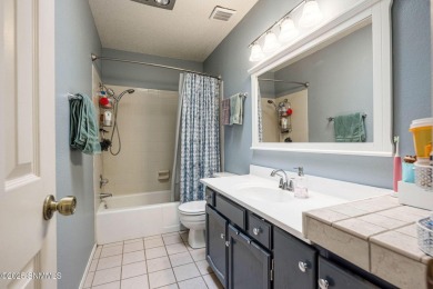 Spacious and bright 2-bed, 2-bath Southwestern-style home just on Sonoma Ranch Golf Course in New Mexico - for sale on GolfHomes.com, golf home, golf lot