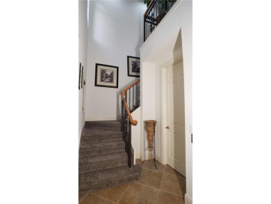Absolutely stunning 3 bedroom 3 bath coach home overlooking the on The Rookery At Marco in Florida - for sale on GolfHomes.com, golf home, golf lot