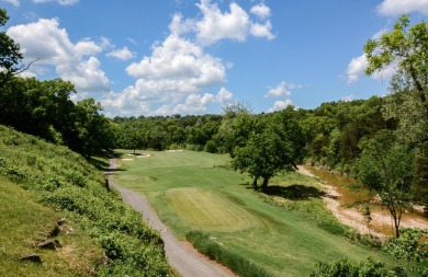 Step into this beautifully renovated 2-bedroom, 2-bath condo on Ledgestone Country Club and Golf Course in Missouri - for sale on GolfHomes.com, golf home, golf lot