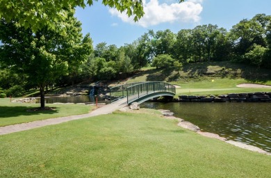 Step into this beautifully renovated 2-bedroom, 2-bath condo on Ledgestone Country Club and Golf Course in Missouri - for sale on GolfHomes.com, golf home, golf lot