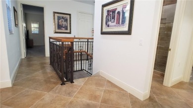 Absolutely stunning 3 bedroom 3 bath coach home overlooking the on The Rookery At Marco in Florida - for sale on GolfHomes.com, golf home, golf lot