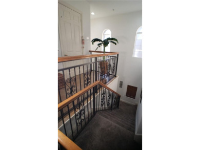Absolutely stunning 3 bedroom 3 bath coach home overlooking the on The Rookery At Marco in Florida - for sale on GolfHomes.com, golf home, golf lot