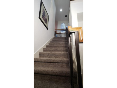 Absolutely stunning 3 bedroom 3 bath coach home overlooking the on The Rookery At Marco in Florida - for sale on GolfHomes.com, golf home, golf lot