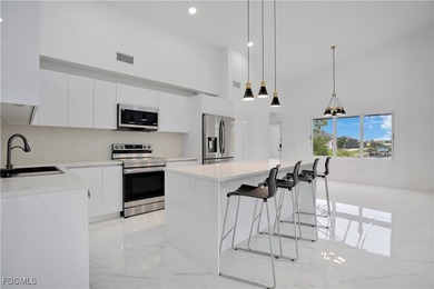 Direct Gulf Access Paradise - Where Every Day Begins on the on Burnt Store Golf Club in Florida - for sale on GolfHomes.com, golf home, golf lot