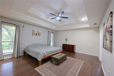 Welcome home to your peaceful double lot RIVERFRONT home in on Pecan Plantation Country Club in Texas - for sale on GolfHomes.com, golf home, golf lot