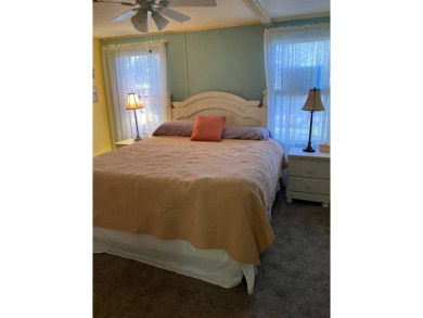 TIRED OF SNOW,ICE AND COLD, TRADE IT IN FOR SUN,WARM AND WHITE on Pine Lakes Country Club in Florida - for sale on GolfHomes.com, golf home, golf lot