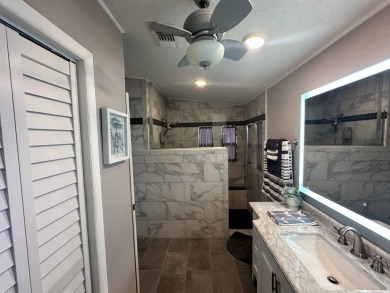 Lot Rent $1342.00 monthly  Beautiful stucco home located on a on Del Tura Golf and Country Club in Florida - for sale on GolfHomes.com, golf home, golf lot