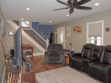 Nestled on a quiet, tree-lined street within walking distance on Spring Green Golf Course in Wisconsin - for sale on GolfHomes.com, golf home, golf lot