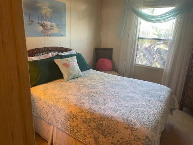 TIRED OF SNOW,ICE AND COLD, TRADE IT IN FOR SUN,WARM AND WHITE on Pine Lakes Country Club in Florida - for sale on GolfHomes.com, golf home, golf lot