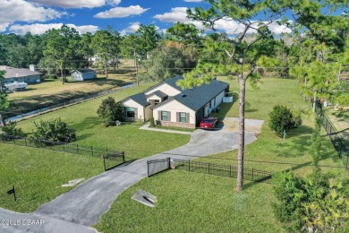 One or more photo(s) have been enhanced or virtually staged on Wedgefield Golf Club in Florida - for sale on GolfHomes.com, golf home, golf lot