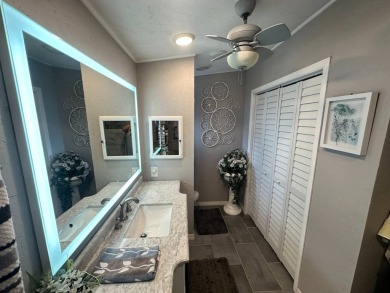 Lot Rent $1342.00 monthly  Beautiful stucco home located on a on Del Tura Golf and Country Club in Florida - for sale on GolfHomes.com, golf home, golf lot