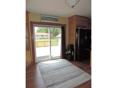 Nestled on a quiet, tree-lined street within walking distance on Spring Green Golf Course in Wisconsin - for sale on GolfHomes.com, golf home, golf lot