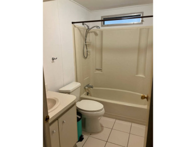 TIRED OF SNOW,ICE AND COLD, TRADE IT IN FOR SUN,WARM AND WHITE on Pine Lakes Country Club in Florida - for sale on GolfHomes.com, golf home, golf lot