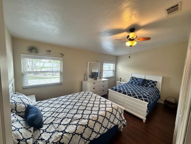 Lot Rent $1342.00 monthly  Beautiful stucco home located on a on Del Tura Golf and Country Club in Florida - for sale on GolfHomes.com, golf home, golf lot