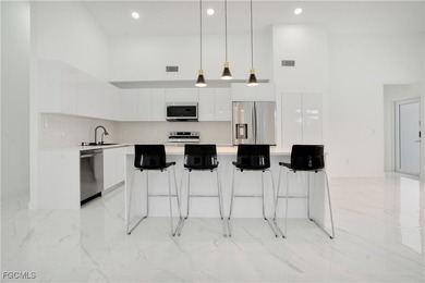 Direct Gulf Access Paradise - Where Every Day Begins on the on Burnt Store Golf Club in Florida - for sale on GolfHomes.com, golf home, golf lot