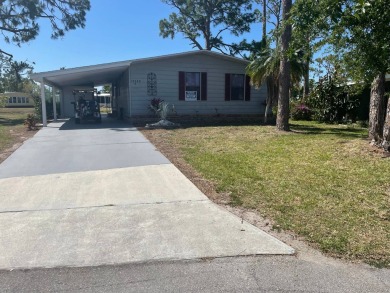 TIRED OF SNOW,ICE AND COLD, TRADE IT IN FOR SUN,WARM AND WHITE on Pine Lakes Country Club in Florida - for sale on GolfHomes.com, golf home, golf lot