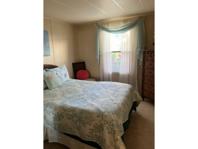TIRED OF SNOW,ICE AND COLD, TRADE IT IN FOR SUN,WARM AND WHITE on Pine Lakes Country Club in Florida - for sale on GolfHomes.com, golf home, golf lot